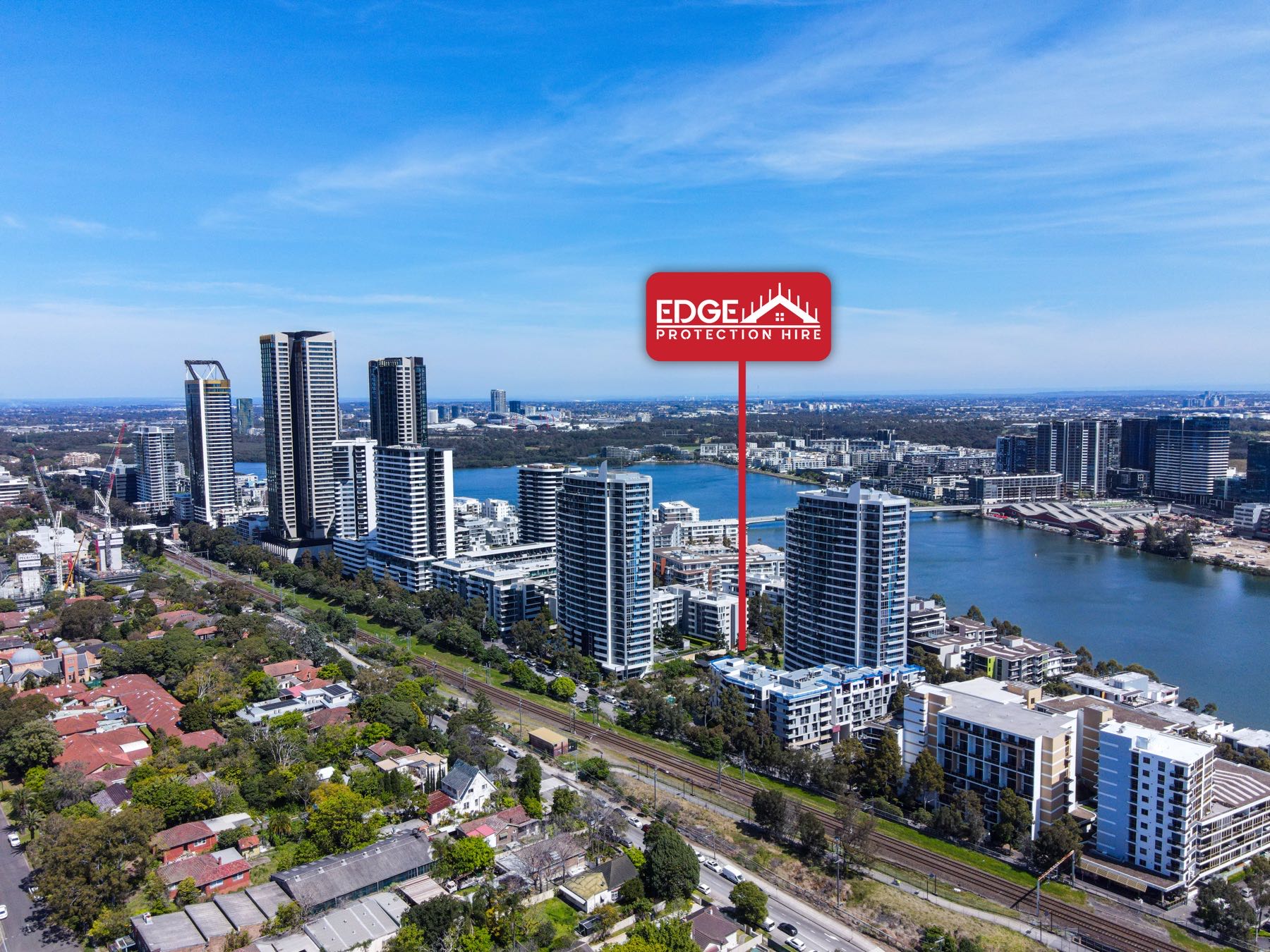 Aerial drone photo of a rooftop edge protection install in Rhodes