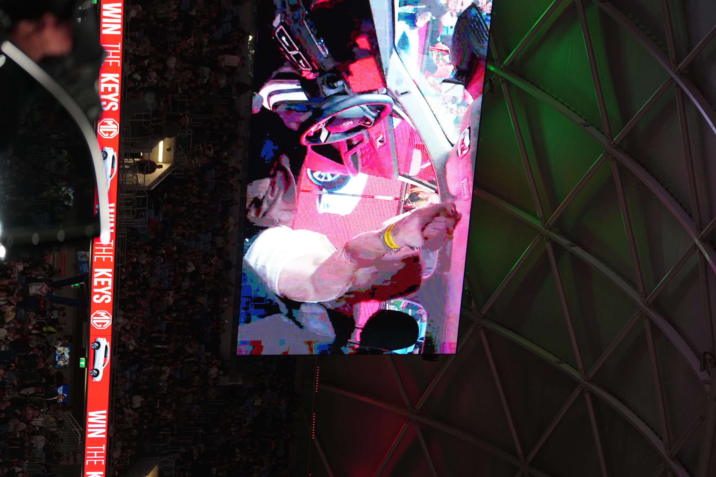 Big screen replay of the Win the Keys winner inside the MG HS Hybrid+, Allianz Stadium