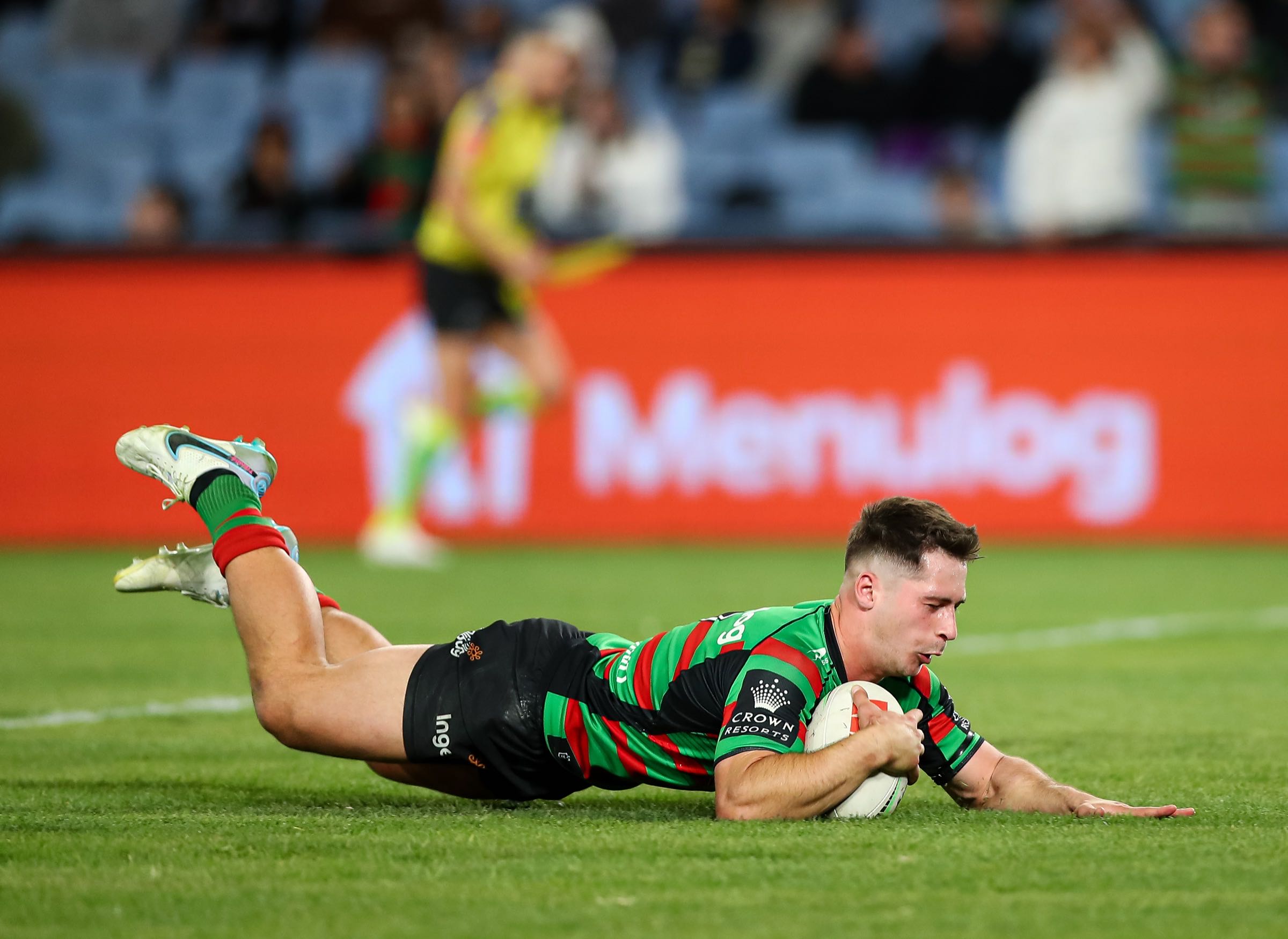 LED perimeter board visible in the background of live NRL play