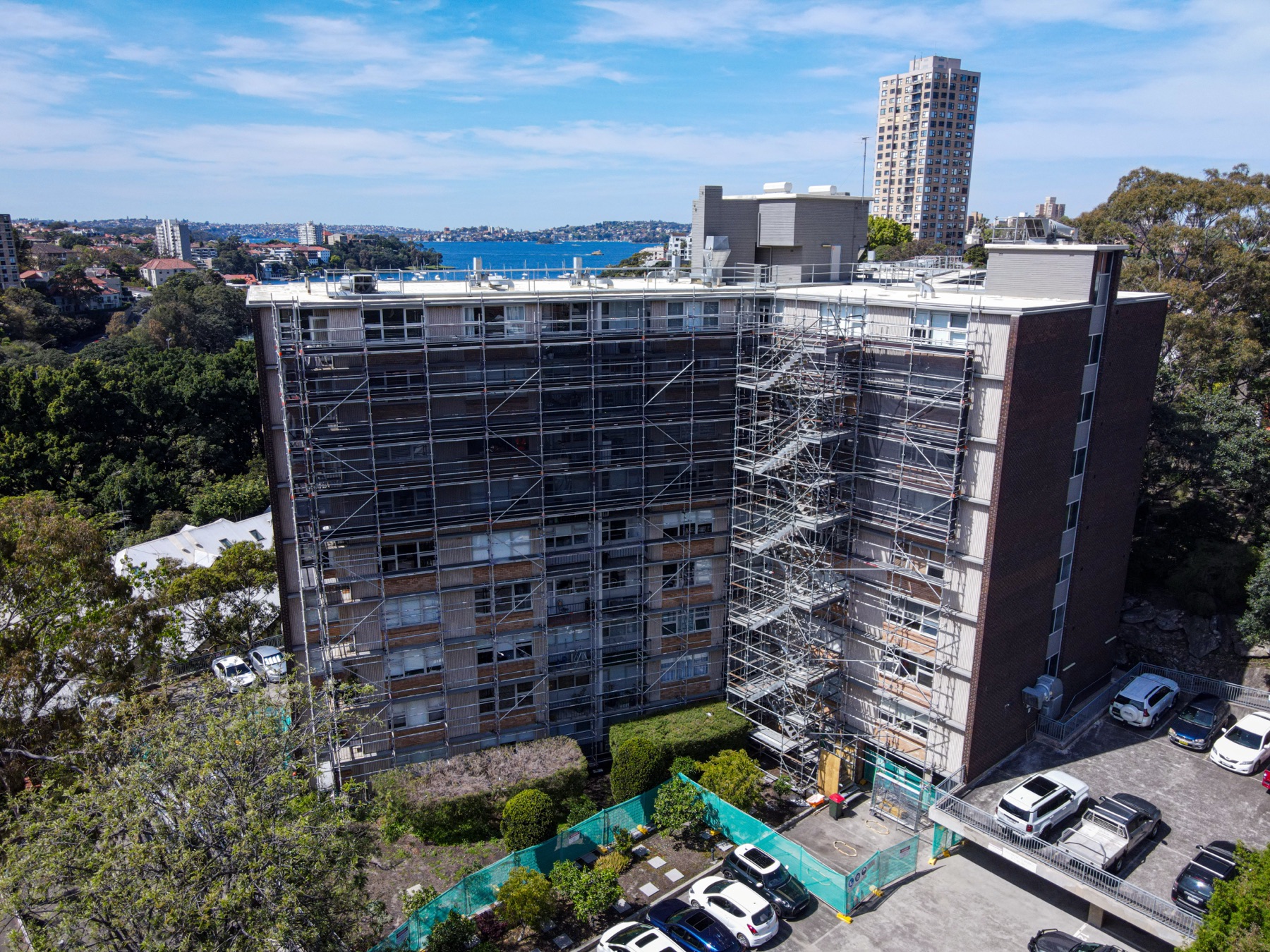 Aerial drone photo of a scaffold site in North Sydney, Sydney Harbour in the background
